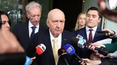 Sex Abuse Charges Targeting Top Australian Media Personality Reduced